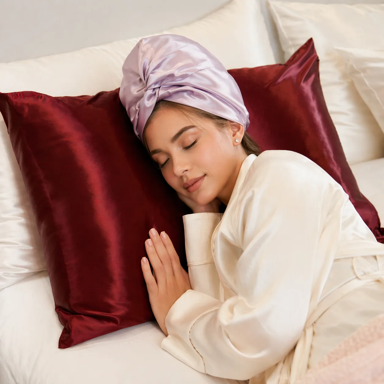 Lifestyle image of a lavender custom silk bonnet for private label hair care and beauty brand sleepwear collections