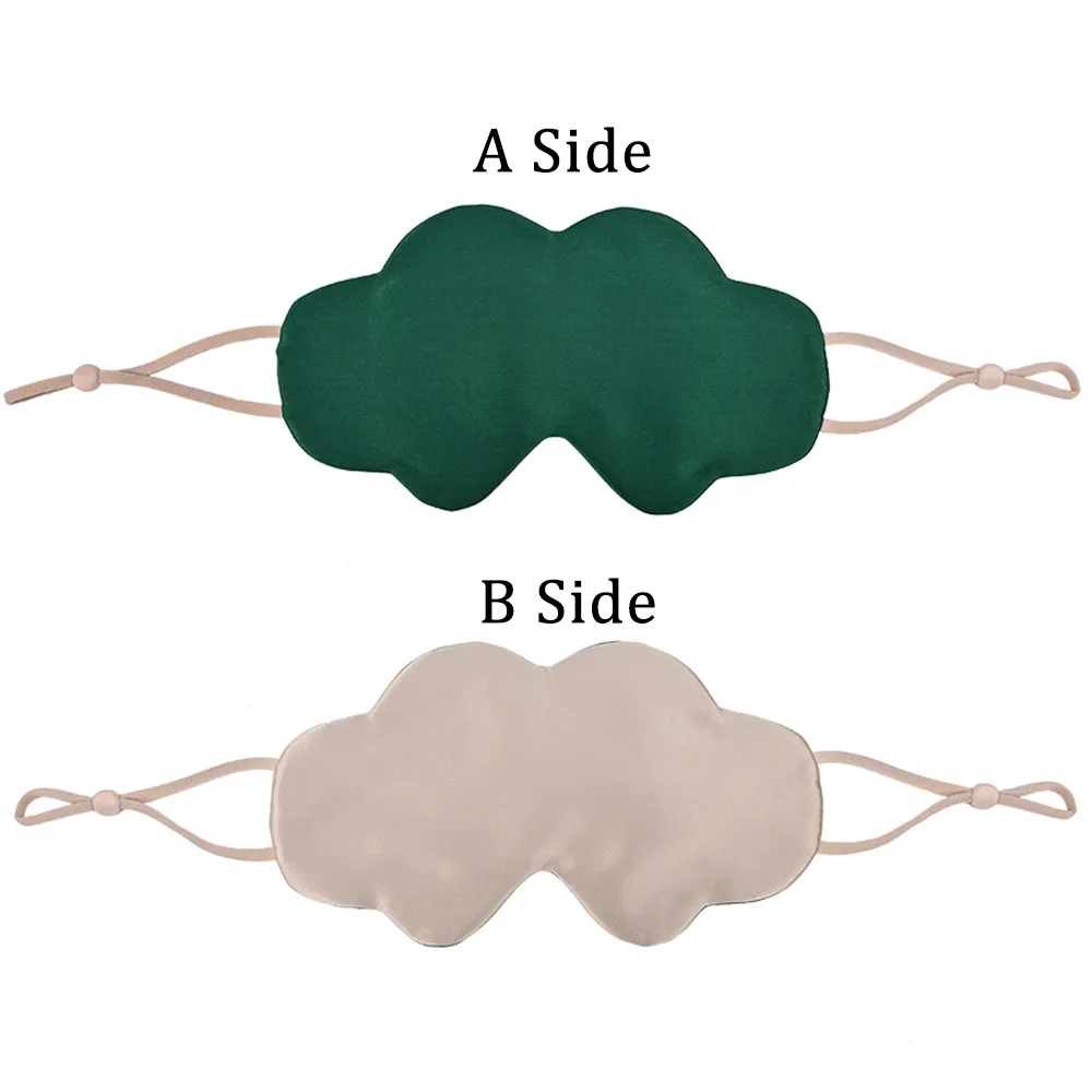 Detail view of cloud-shaped ear-loop silk sleep mask showing A/B side color options for private label travel, spa, and gift sets