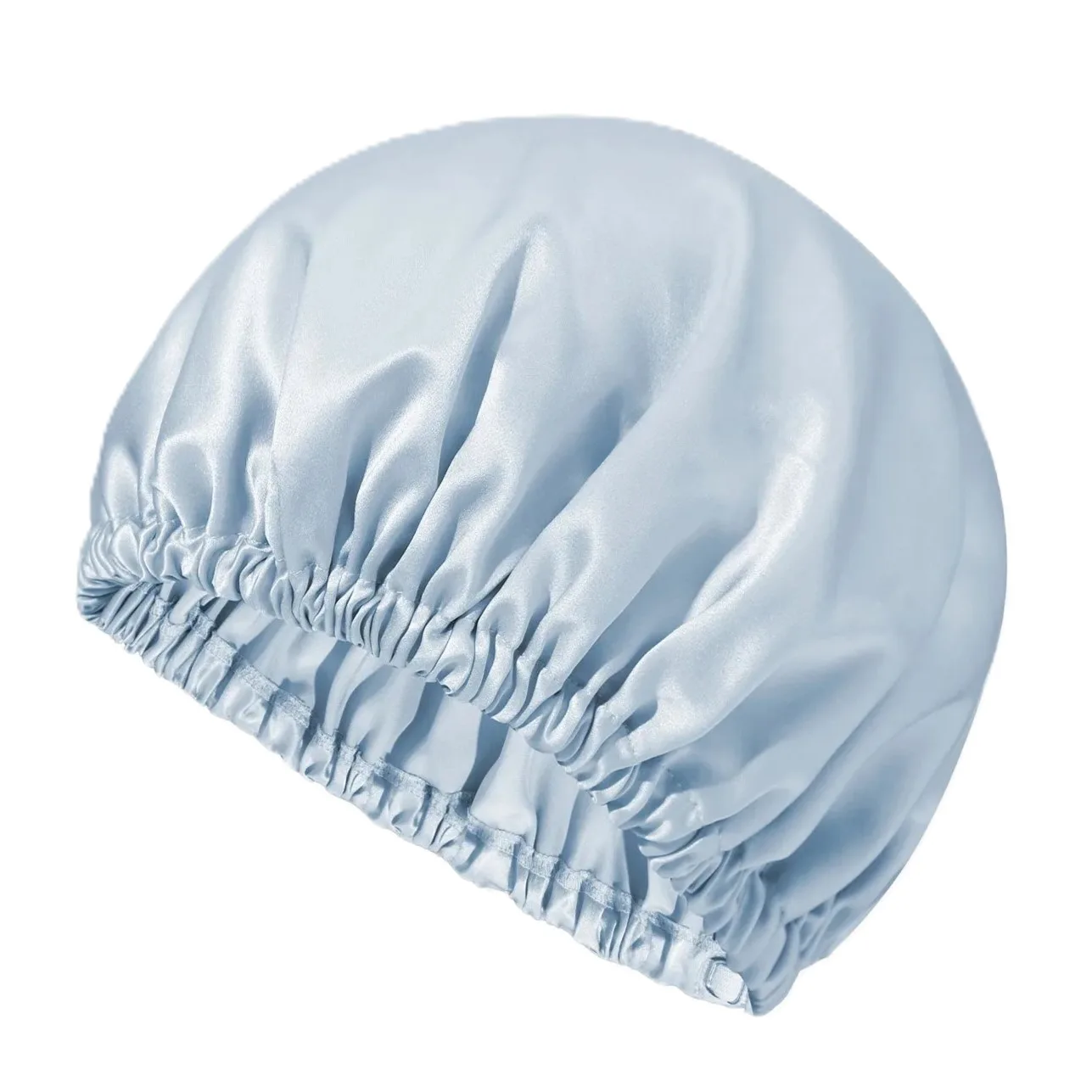 Detail view of light blue silk bonnet with gathered elastic edge for custom private label gift sets
