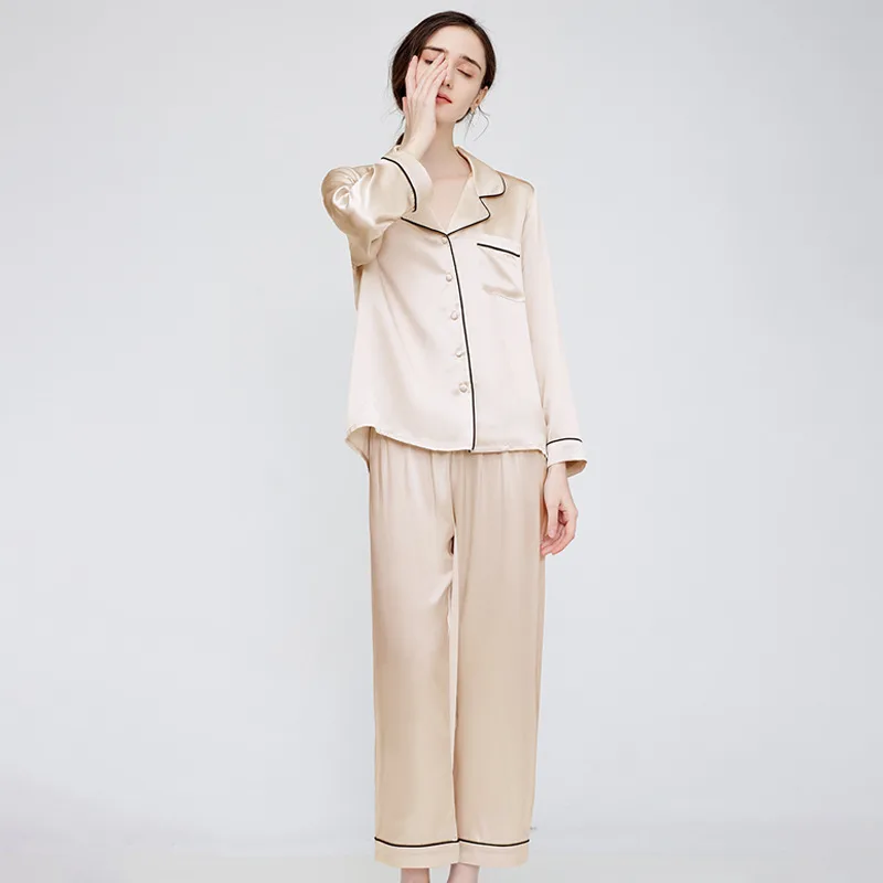 Champagne-tone long sleeve silk pajama style with black piping, shown as a private label sleepwear color variant for brand customization