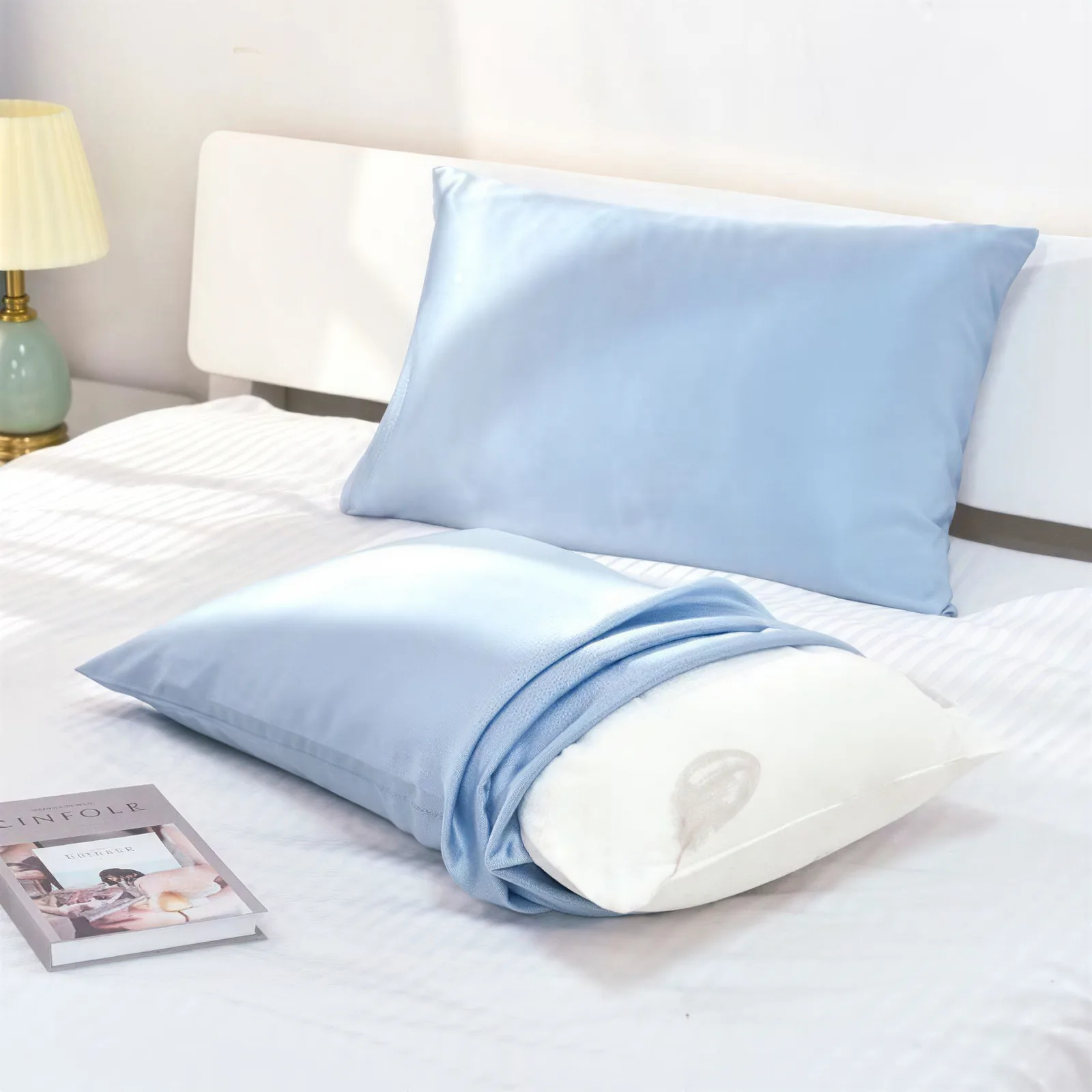 Light blue custom silk pillowcase lifestyle display for private label hair and sleep care brand review