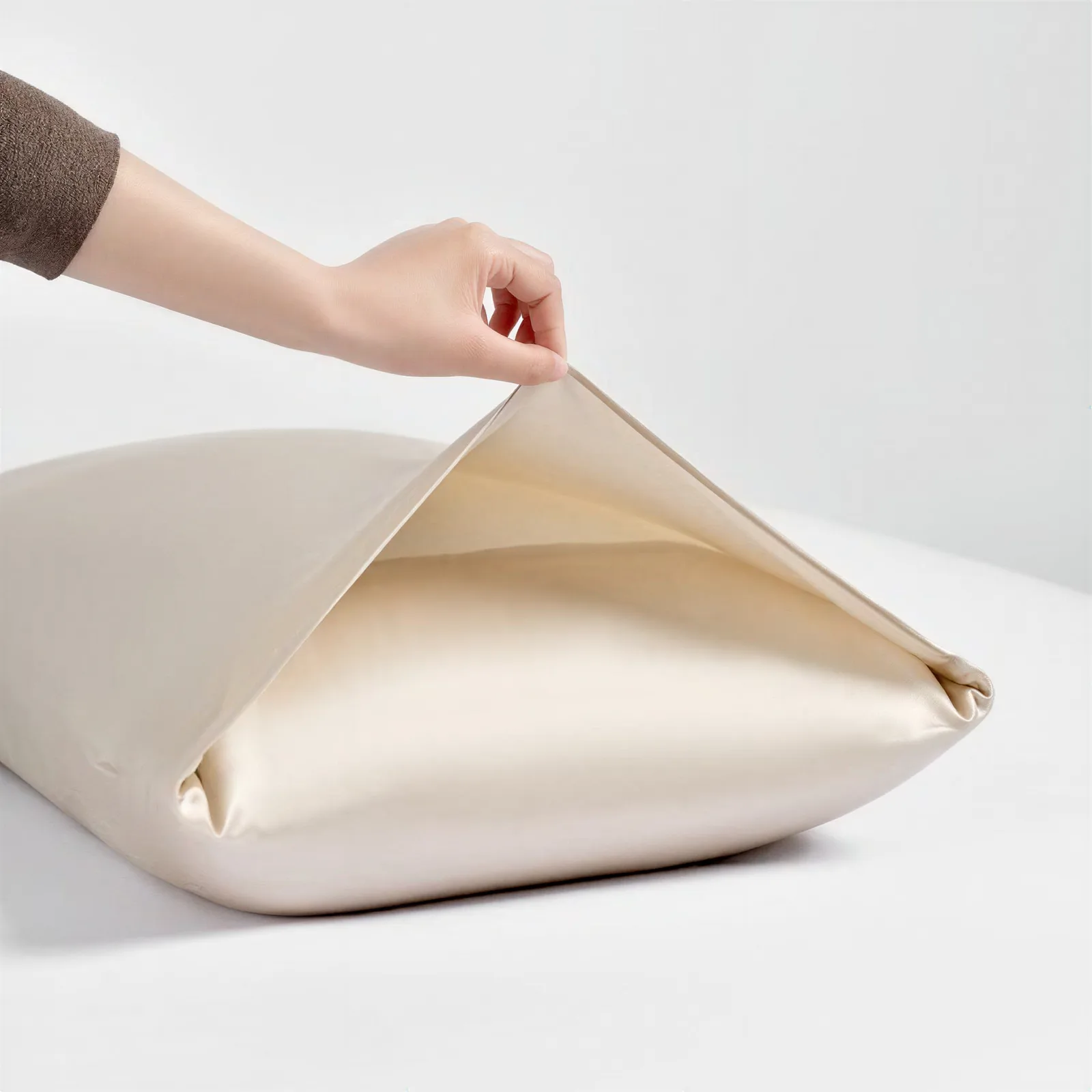 Champagne custom silk pillowcase envelope closure detail for private label hair and sleep care brands