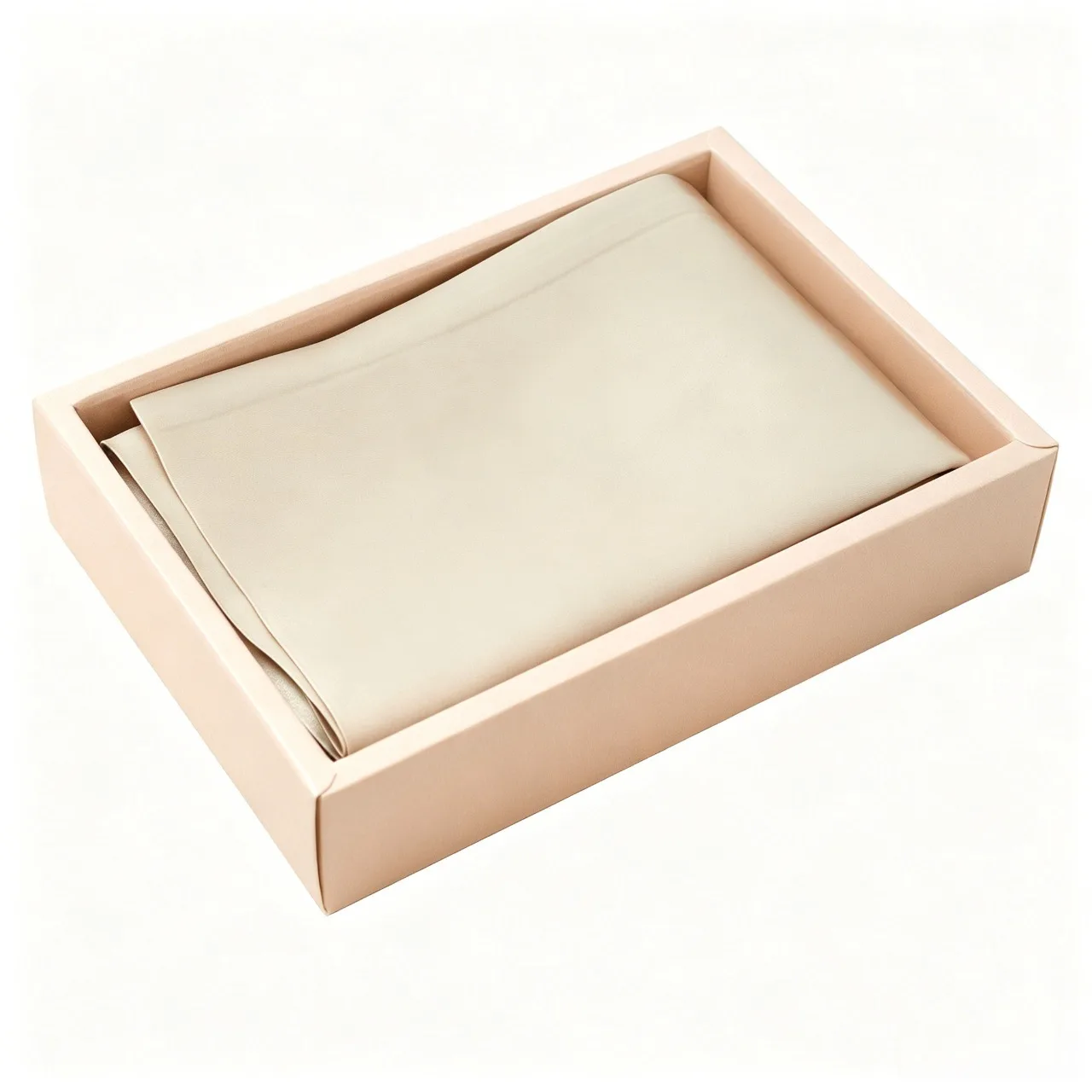 Champagne custom silk pillowcase presented in a peach gift box for private label beauty, hair care, and sleep care brands