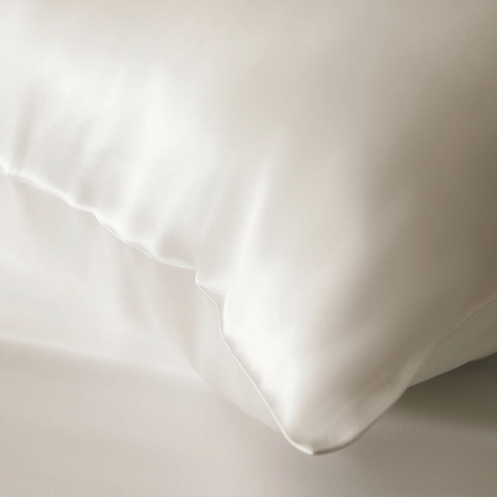 Detail view of ivory silk gift set fabric finish for private label beauty, spa, and retail customization