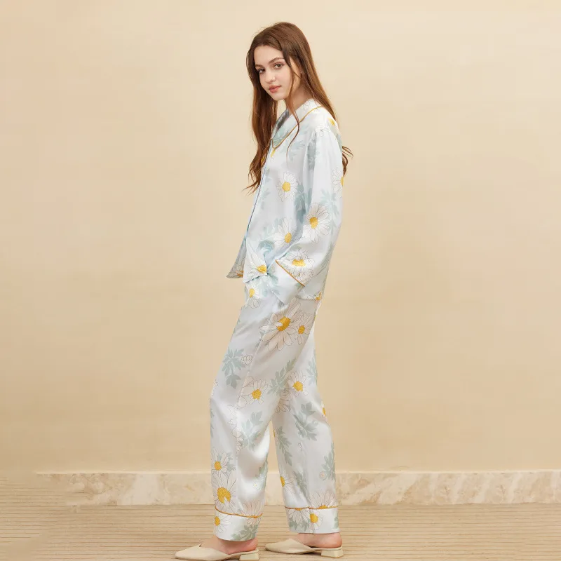 Light blue floral long sleeve custom silk pajama set with contrast piping for private label sleepwear brands