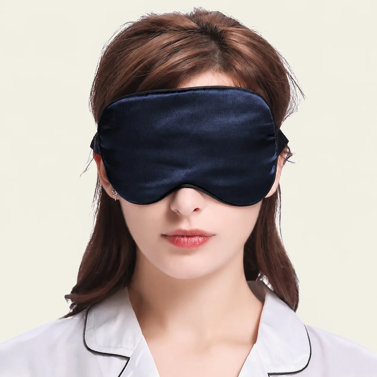 Navy private label sleep mask with contrast piping and side label for custom silk gift set programs