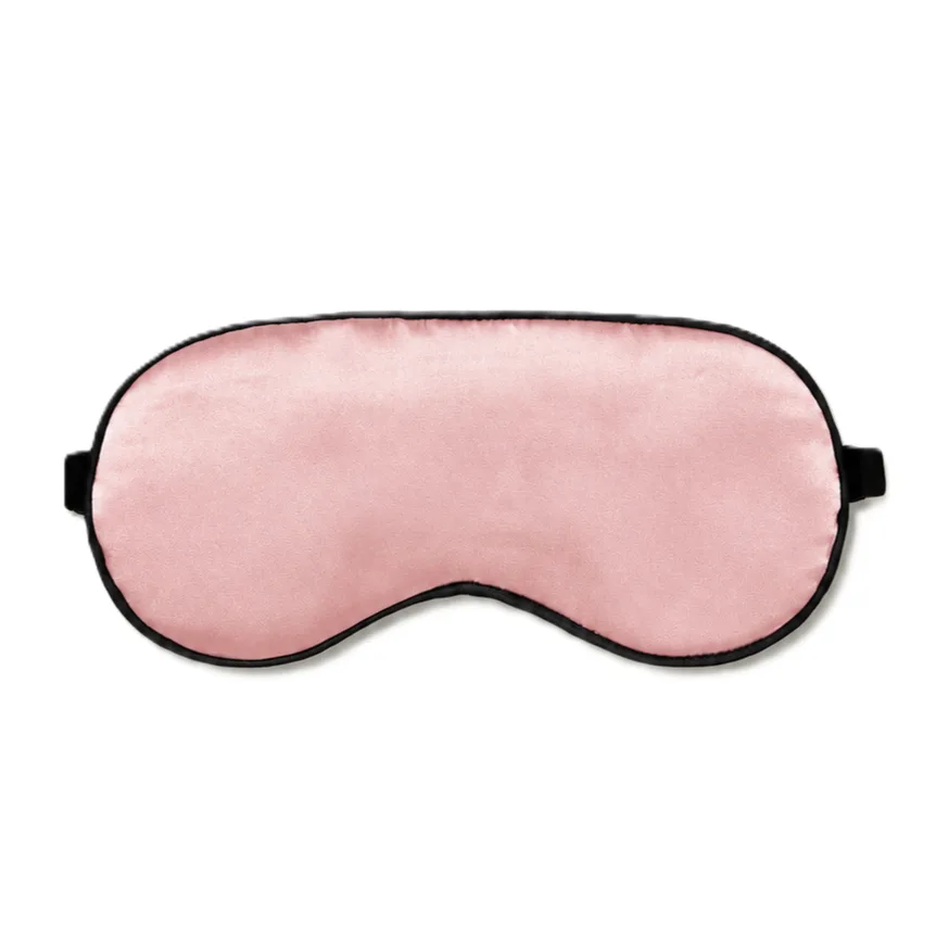 Pink sleep mask with black piping and side woven label for custom silk gift set private label programs