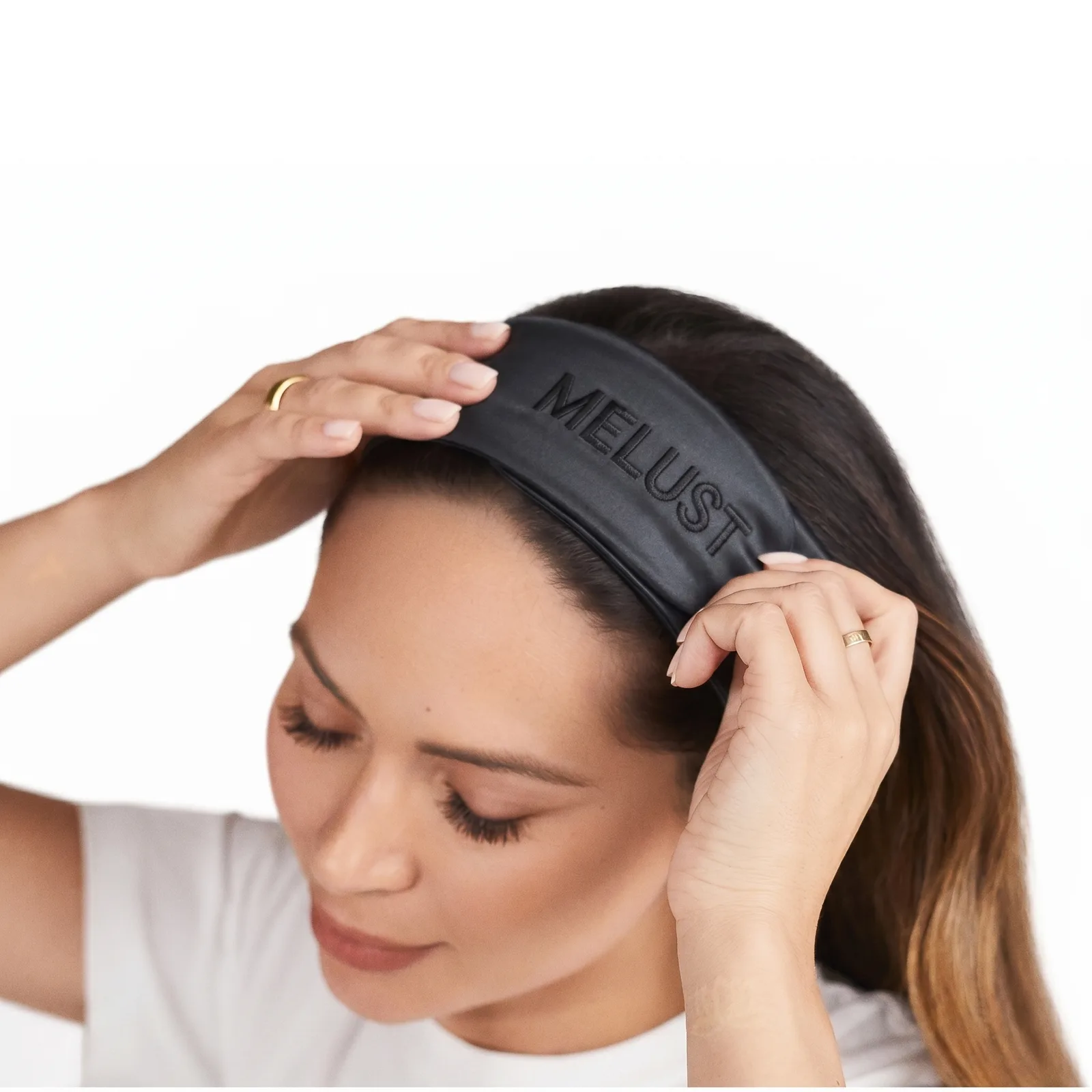 Black wide custom silk headband with tone-on-tone front logo placement for private label beauty brand review