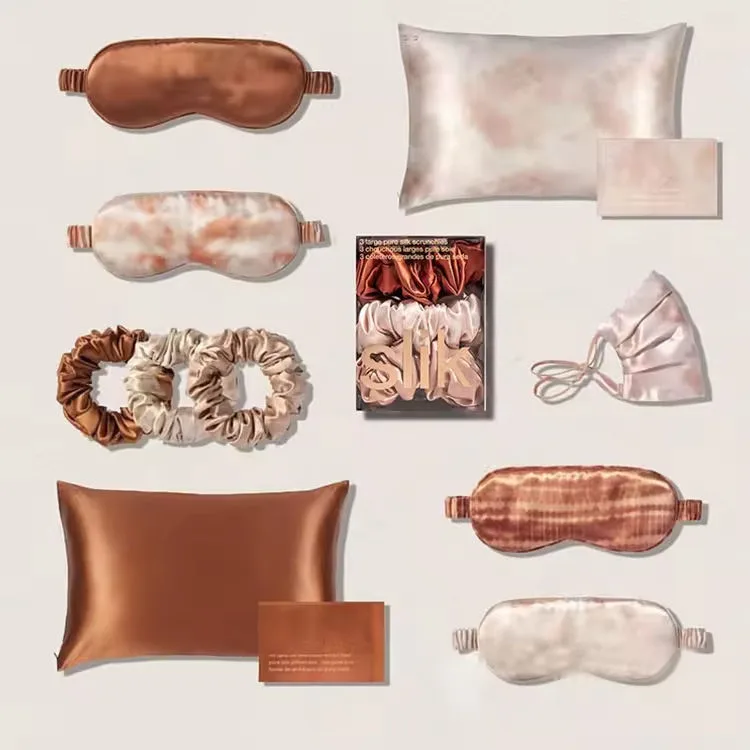 Référence d’ensemble coordonné d’échantillons de soins en soie avec masques de sommeil, taies d’oreiller, chouchous et pochette pour la planification en marque privée