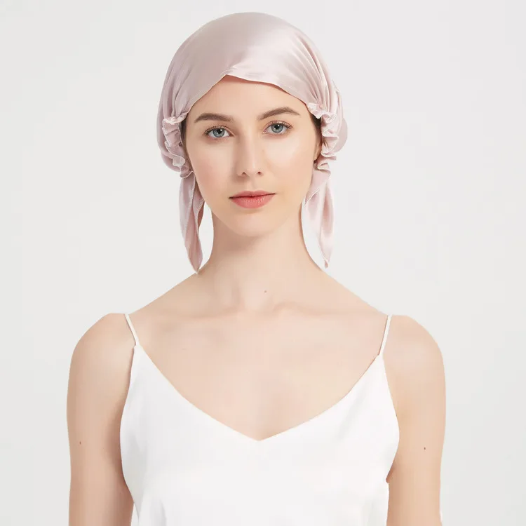 Pale pink custom silk sleep cap style with gathered edge and tie back for private label hair care brands