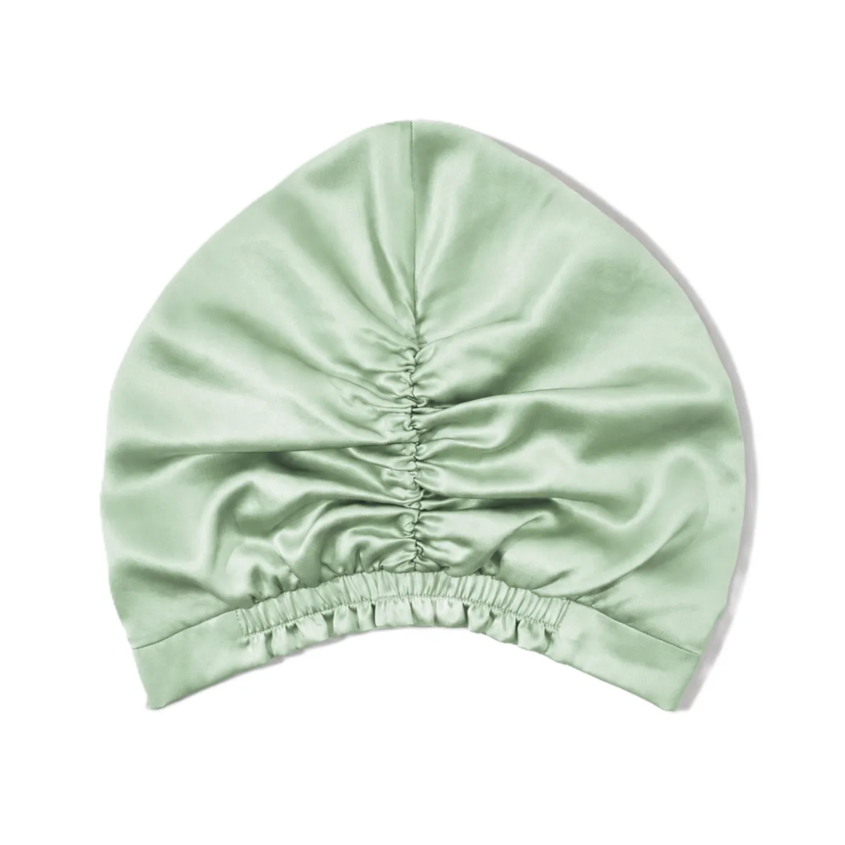 Light green custom silk sleep cap detail with gathered back and elastic edge for private label hair care brands