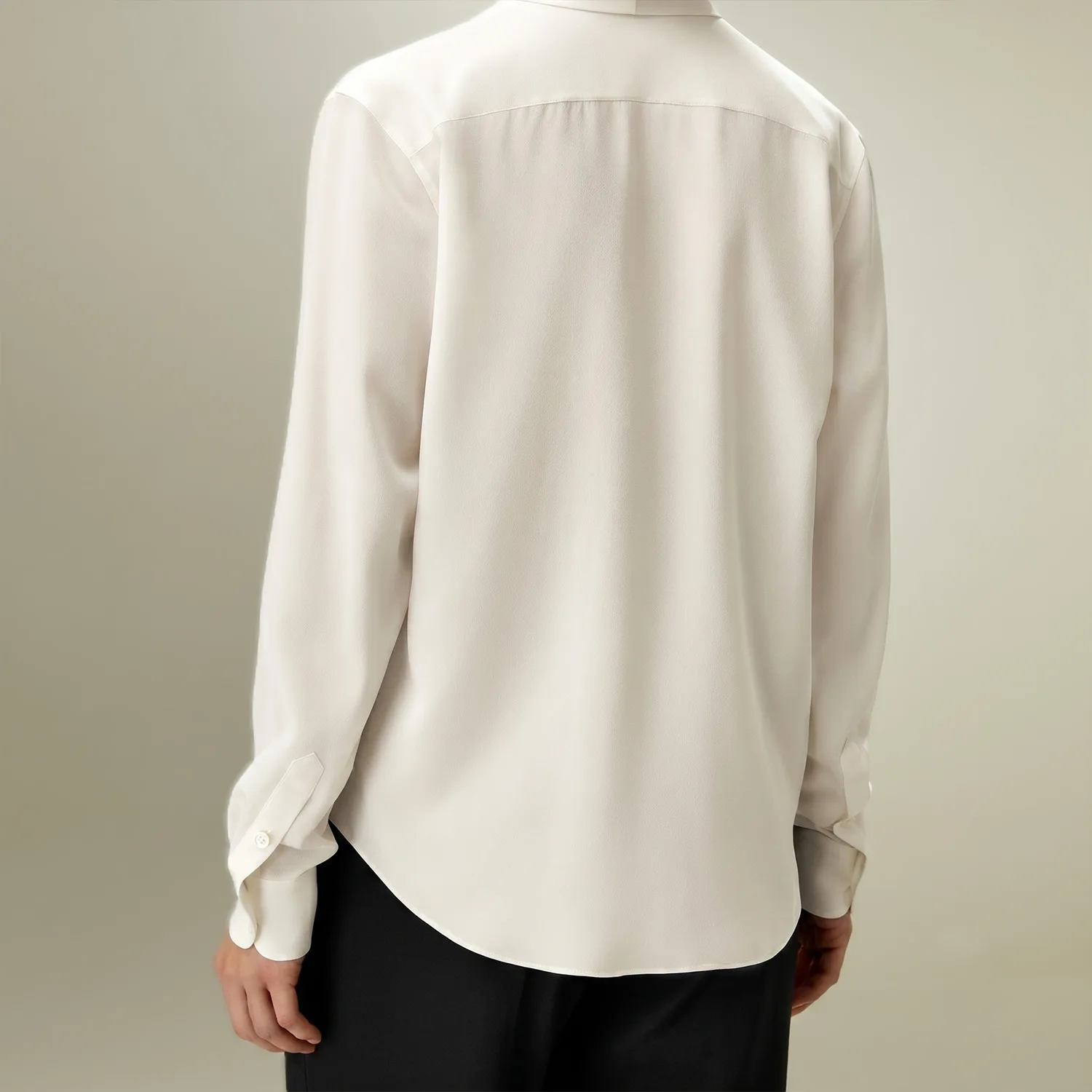 Back detail view of an ivory long sleeve shirt style for custom silk clothing private label apparel projects