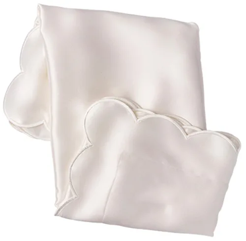 Ivory custom silk pillowcase detail with scalloped edge for private label hair and sleep care lines