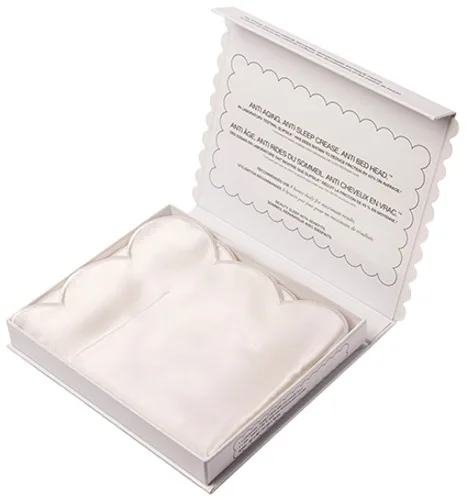 Open branded gift box packaging for a custom silk pillowcase sample, showing a retail-ready insert card for private label hair and sleep care lines