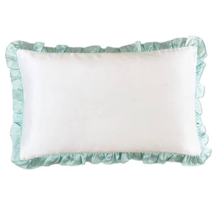 Detail view of custom silk pillowcase style with white center and mint ruffle border for private label hair and sleep care lines