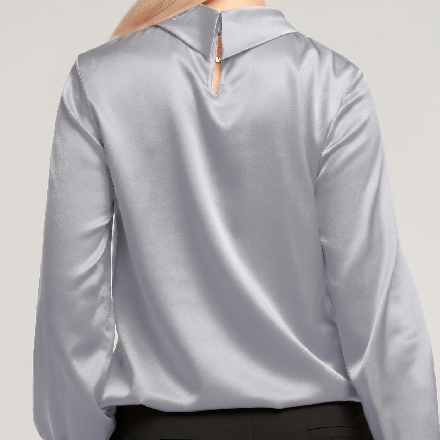 Back detail of silver long sleeve custom silk apparel style with collar and zipper opening for private label clothing projects