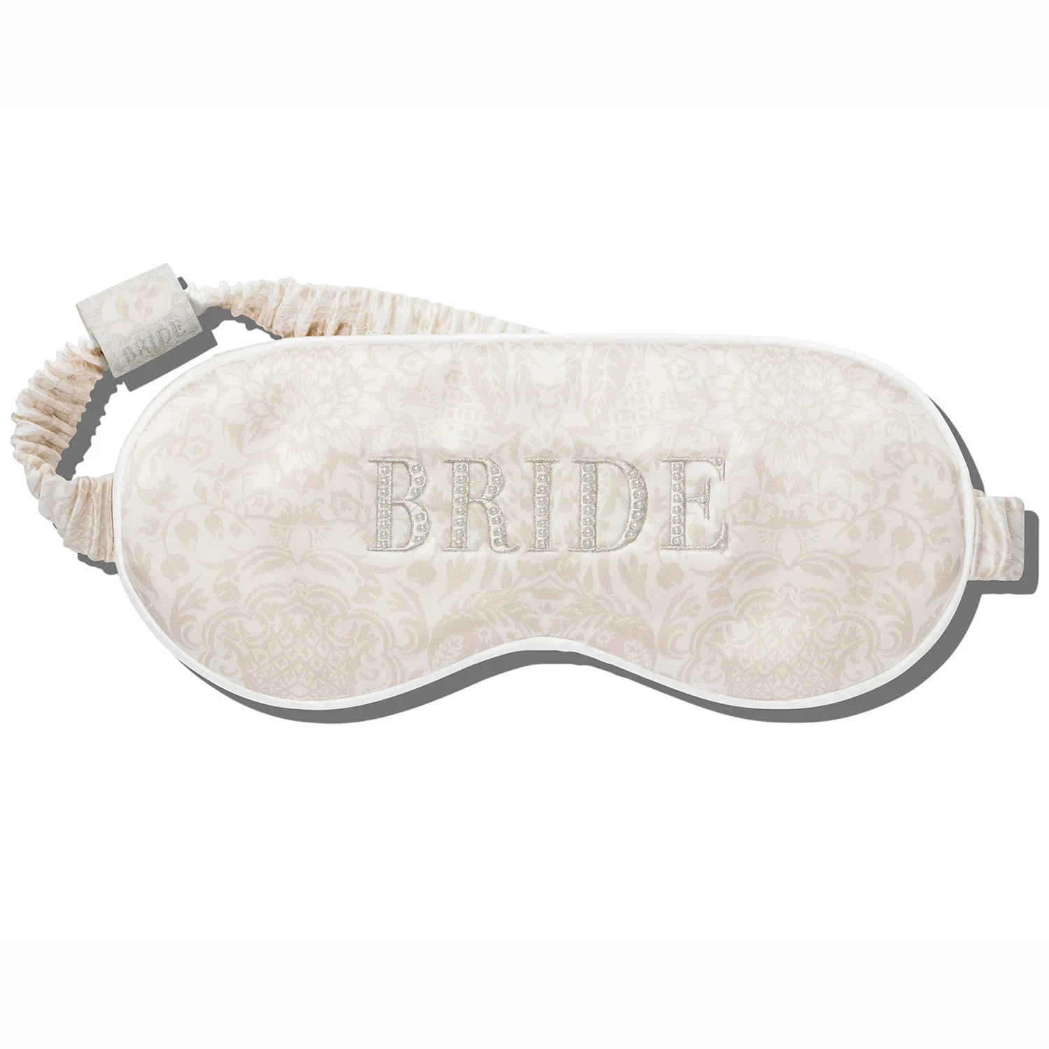 Back view of private label contoured silk sleep mask with gathered elastic strap and logo label placement