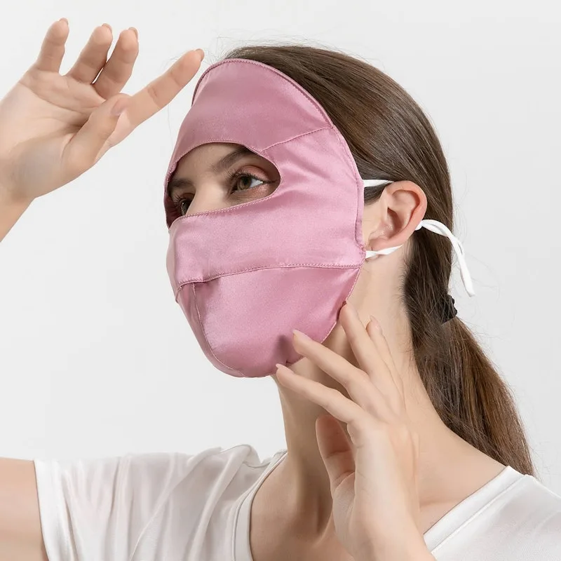 Pink full-coverage silk travel mask with eye opening and tie straps for private label custom silk face mask programs