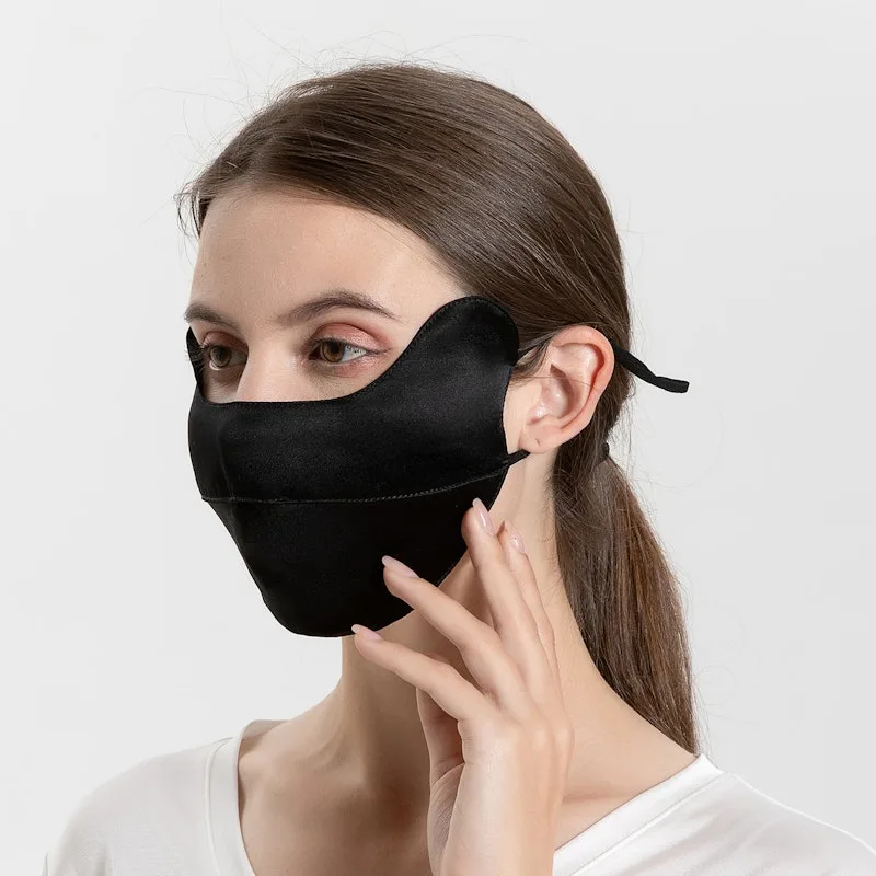 Black sun protection face cover with contoured ear area and tie-back fit for private label custom face mask programs