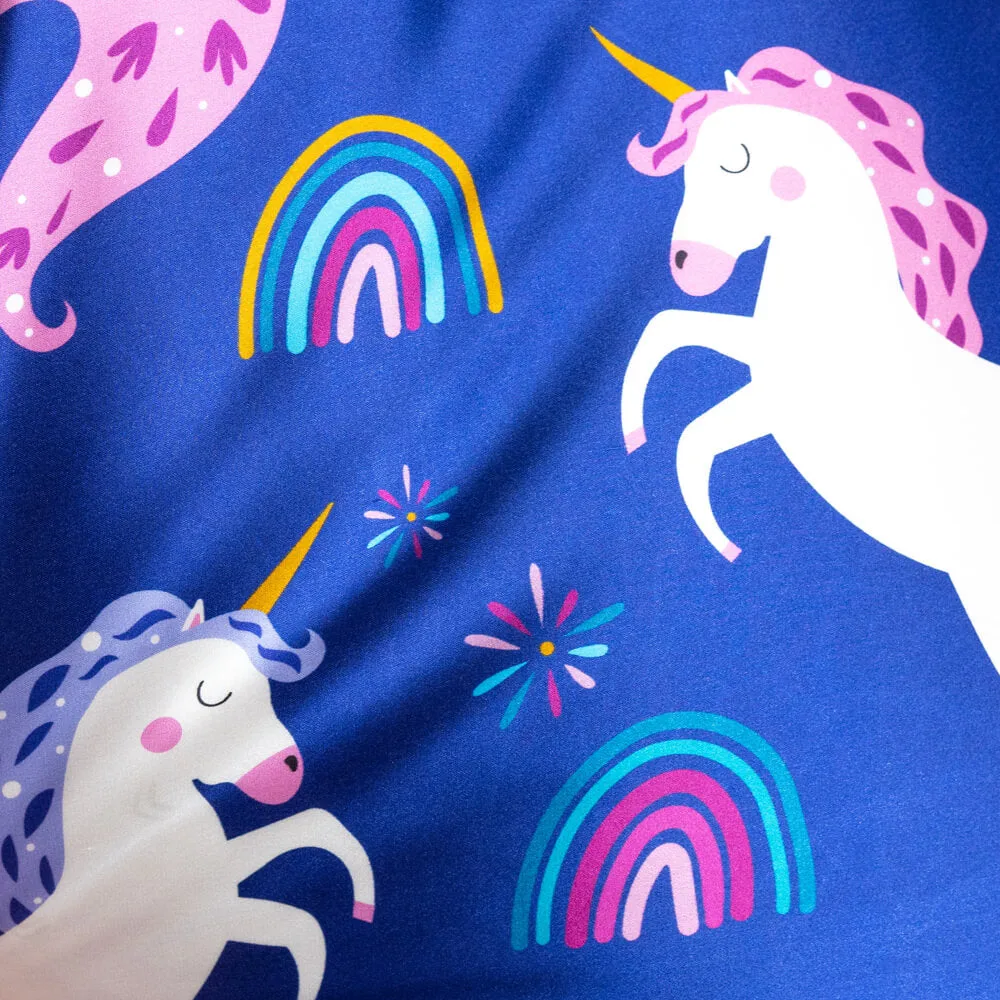 Detail view of custom kids silk sleep mask with unicorn and rainbow print for private label gift and sleepwear programs
