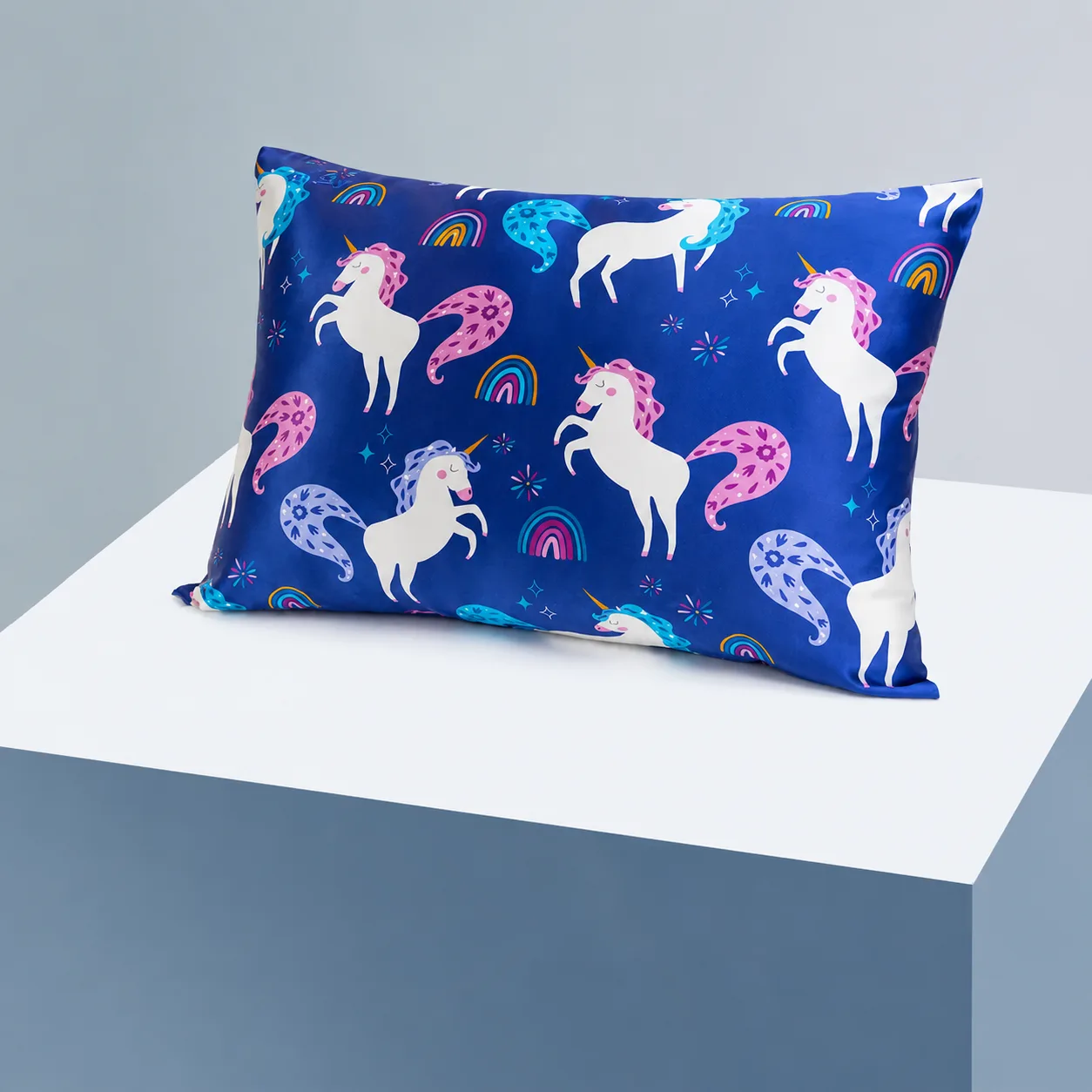 Custom kids silk pillowcase with blue unicorn print for private label children’s sleep product collections