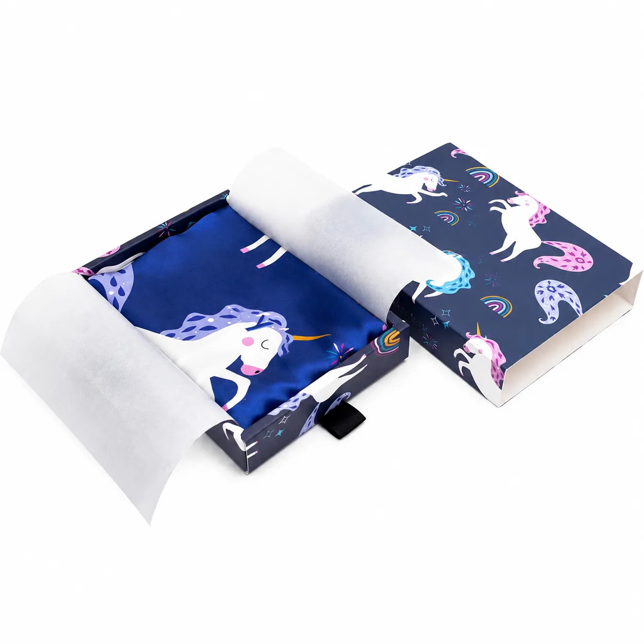 Detail view of custom kids silk pillowcase with unicorn print and matching gift box packaging for private label programs