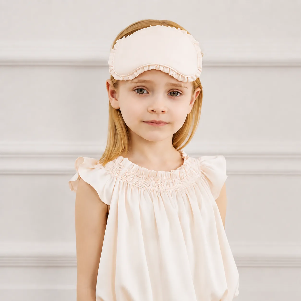 Kids sleep mask with padded eye shape, ruffled seam edge, and elastic headband fit for private label comfort review