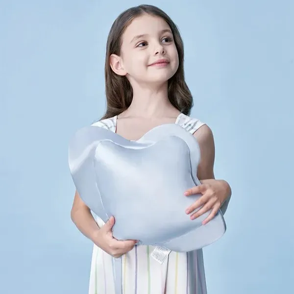 Light blue star-shaped kids silk pillow for private label retail and children’s gift programs, suited to playful branded collections