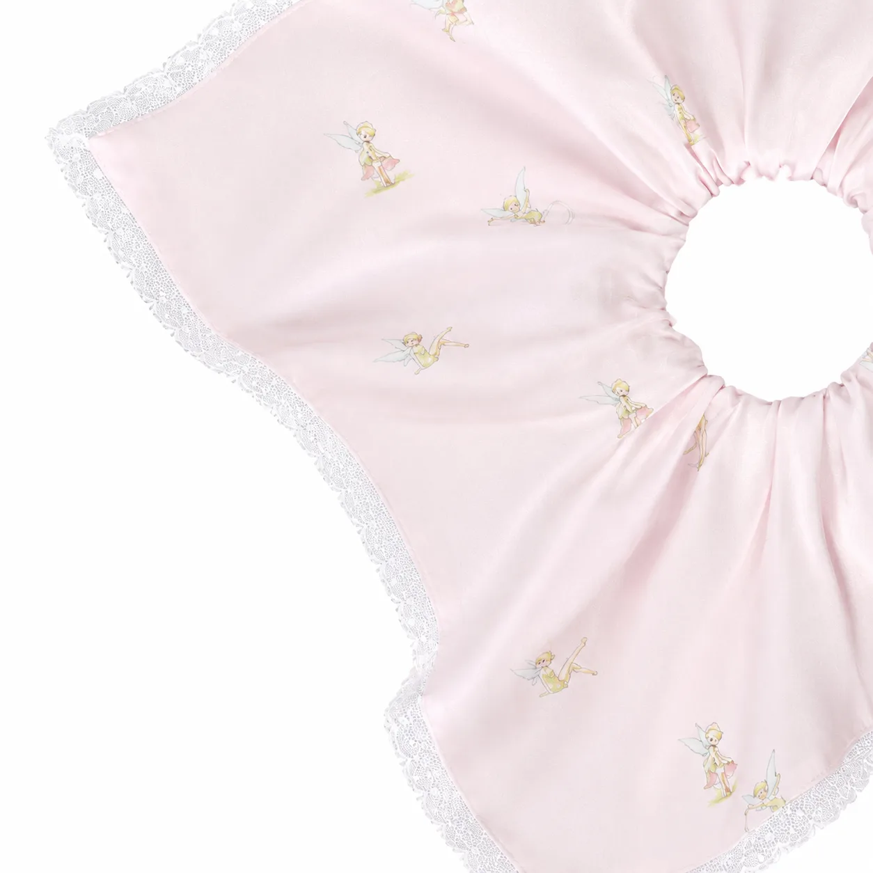 Detail of private label silk scrunchie with gathered elastic ring, wide bow panels, and lace-trimmed edges for comfortable hair hold