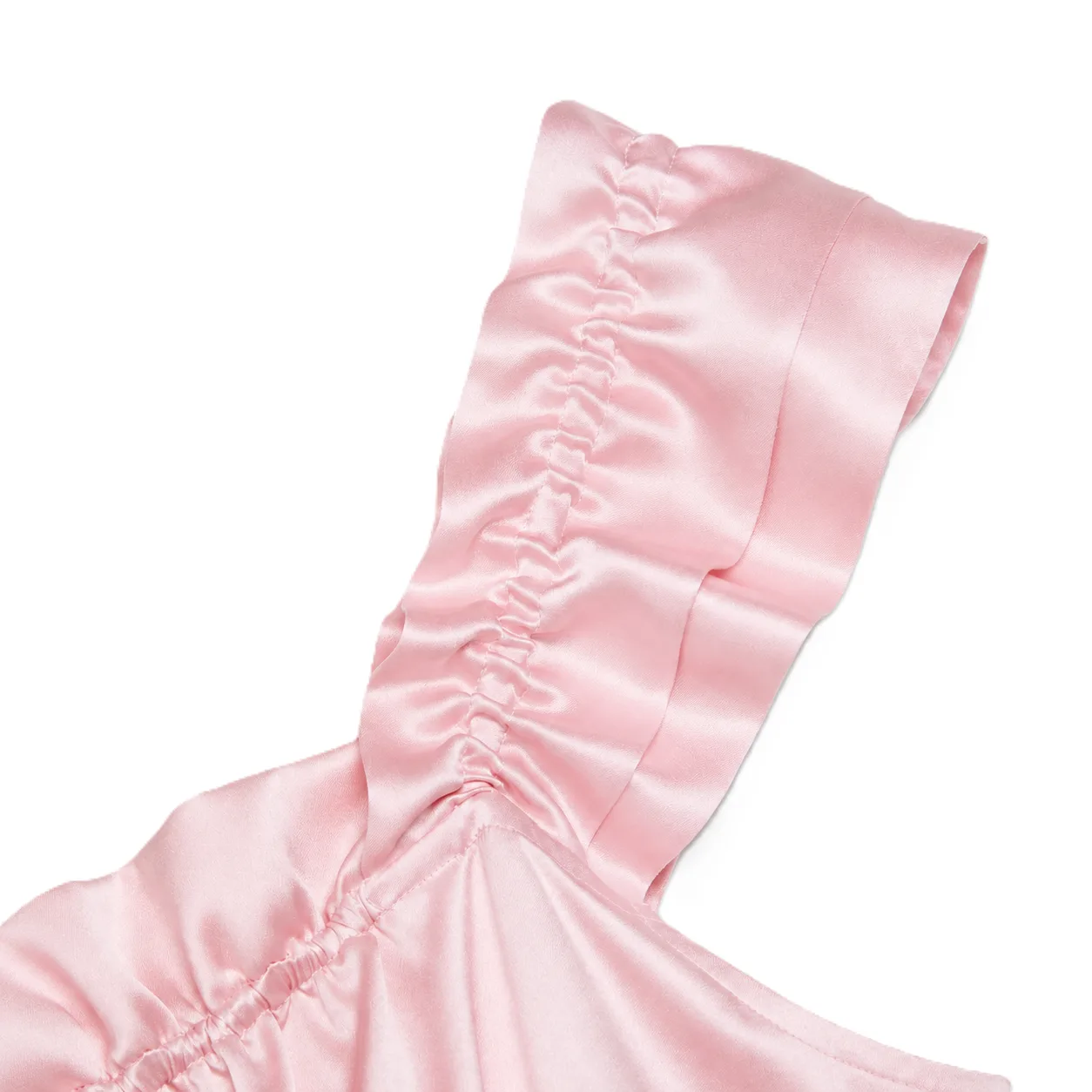 Detail view of custom kids silk bonnet with gathered elastic seam and wide ruffled edge for secure, comfortable private label fit