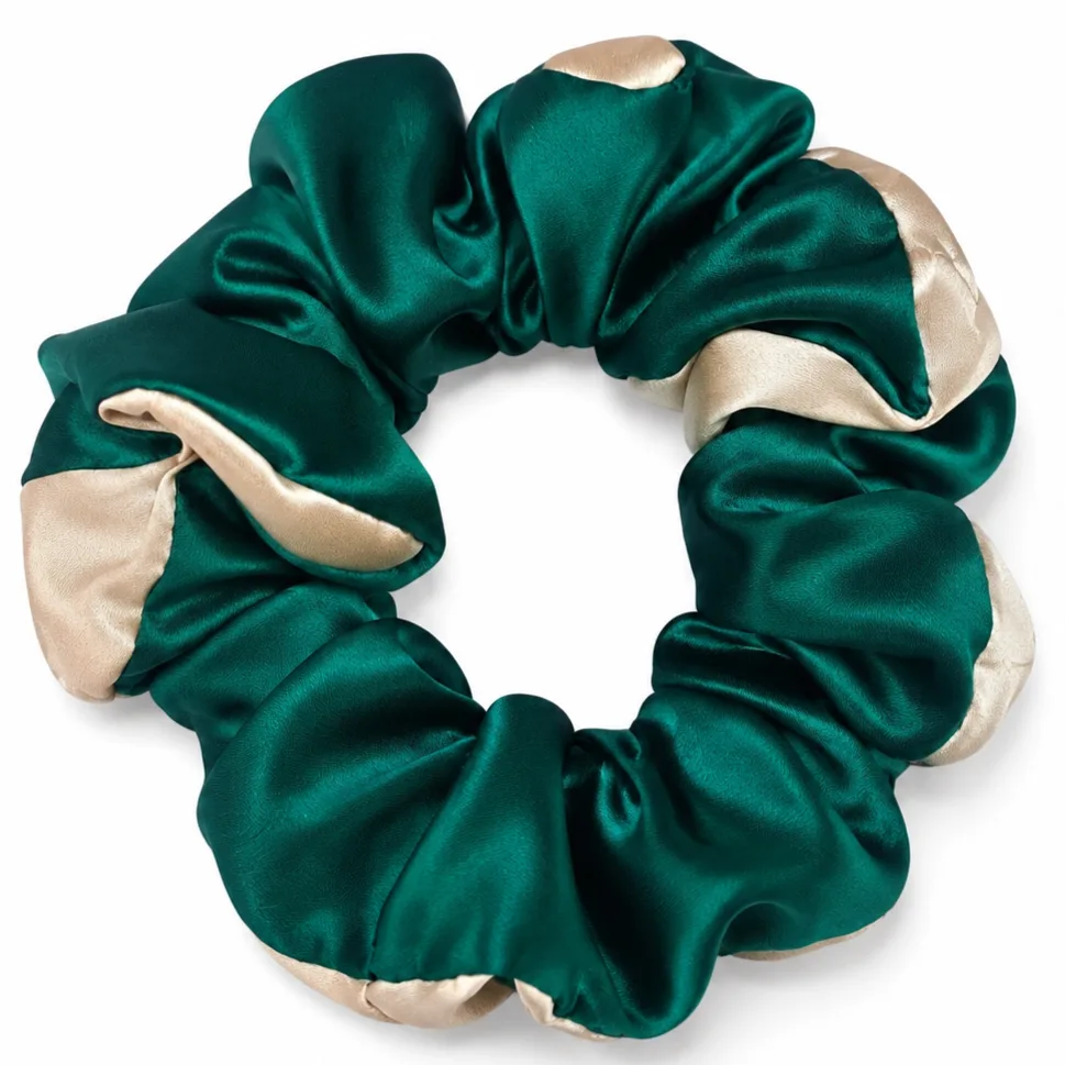 Oversized two-tone silk scrunchie in emerald and champagne dual-color block construction for private label hair care and gift set brands