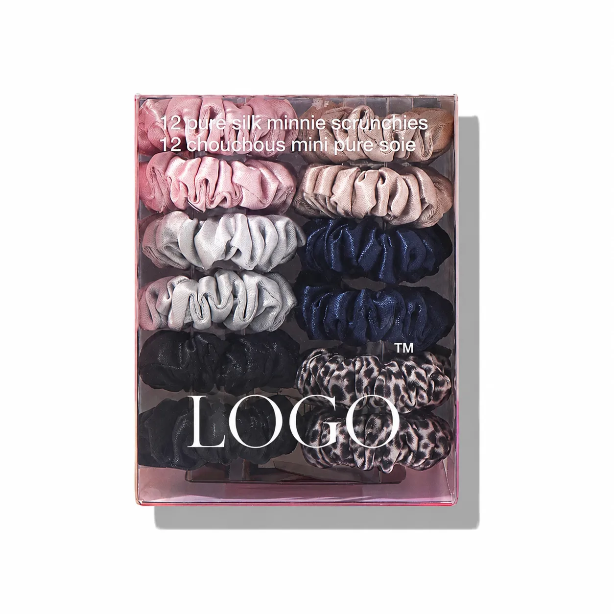 Detail view of mini silk scrunchies with gathered tube construction and covered elastic bands for custom kids private label hair accessories