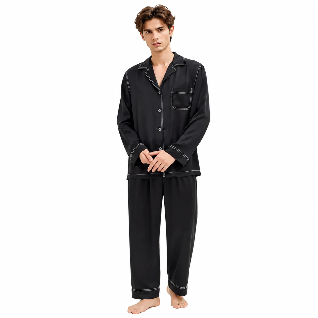 Private label silk pajama set detail showing notched collar, button-front top, piped seams, chest pocket, relaxed long sleeves and straight-leg fit