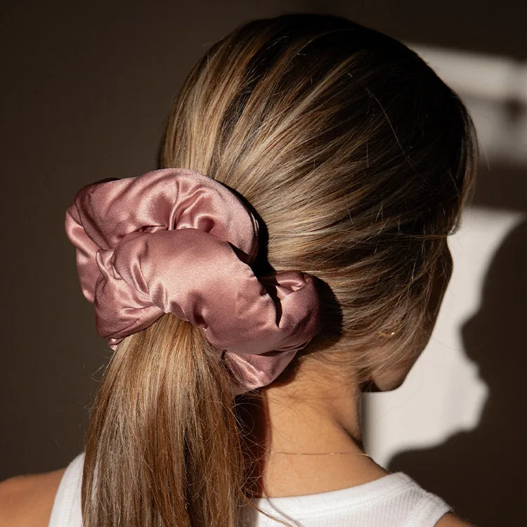 Oversized ruched hair scrunchie with a soft gathered band and covered elastic fit, shown securing a ponytail for private label hair accessory review