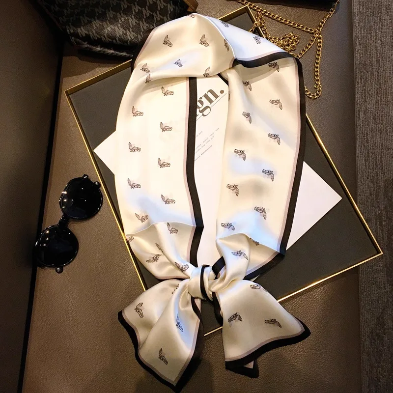 Detail view showcasing the elegant construction and finish of OlaSilk's custom silk scarf, ideal for private label fashion and gift brands