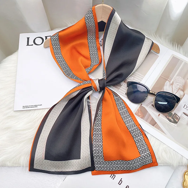 Detail view of a custom silk scarf showcasing fine edges and versatile construction, ideal for private label brands