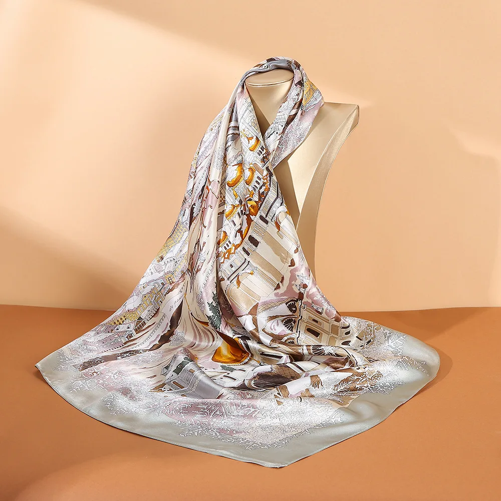 Detail view showcasing the elegant shape, seamless edge finish, and versatile drape of OlaSilk's custom silk scarf for private label fashion brands