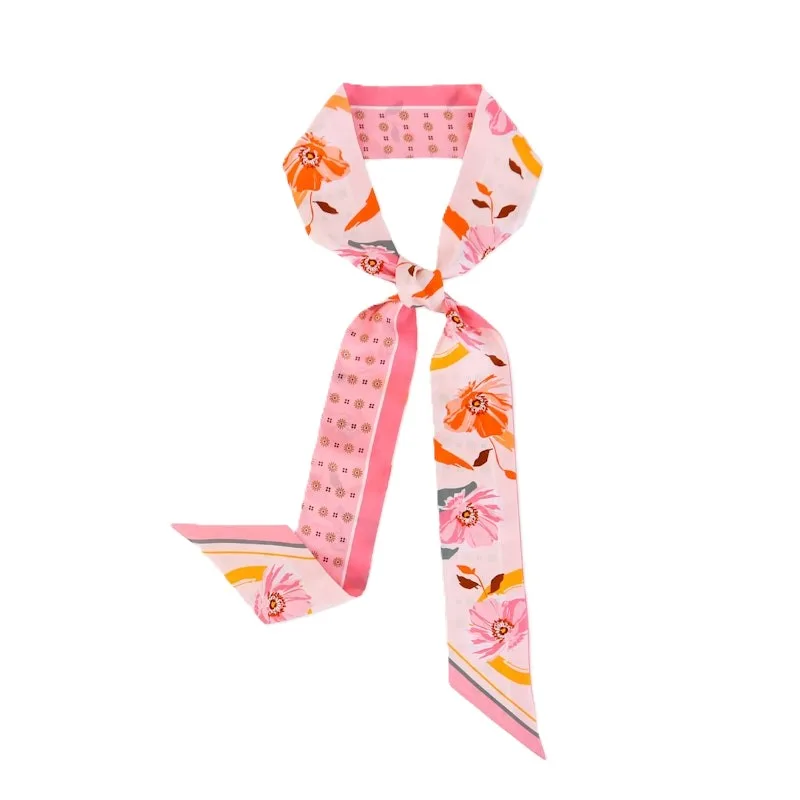 Custom extra-long double-sided silk twill skinny scarf in blush pink floral print, 160 cm length, shown tied as a bow — private label OEM by OlaSilk