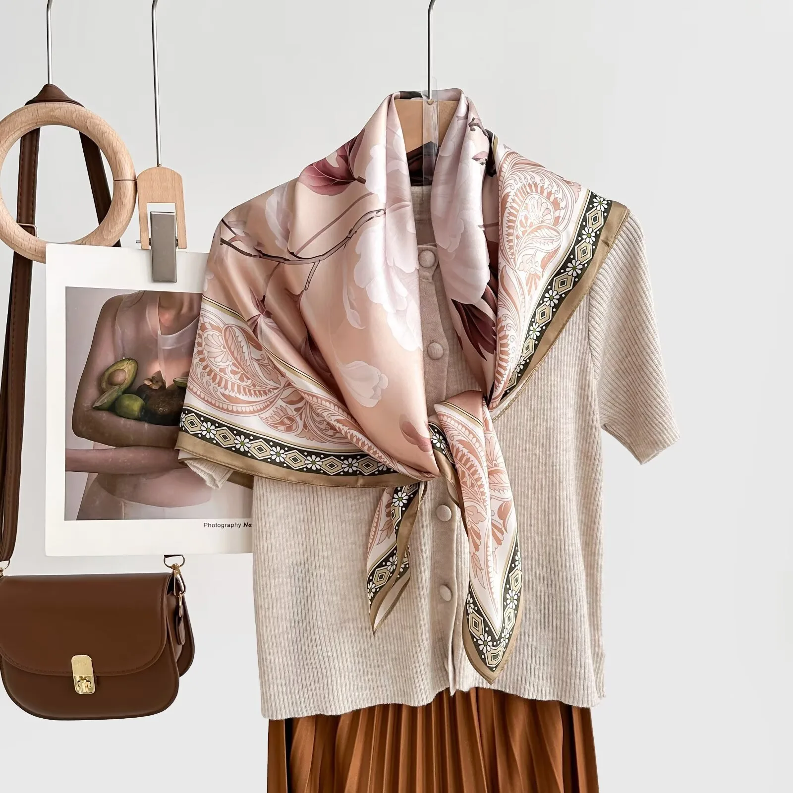 Detail view of the custom silk scarf demonstrate its elegant construction, featuring finished edges and versatile styling options for added comfort