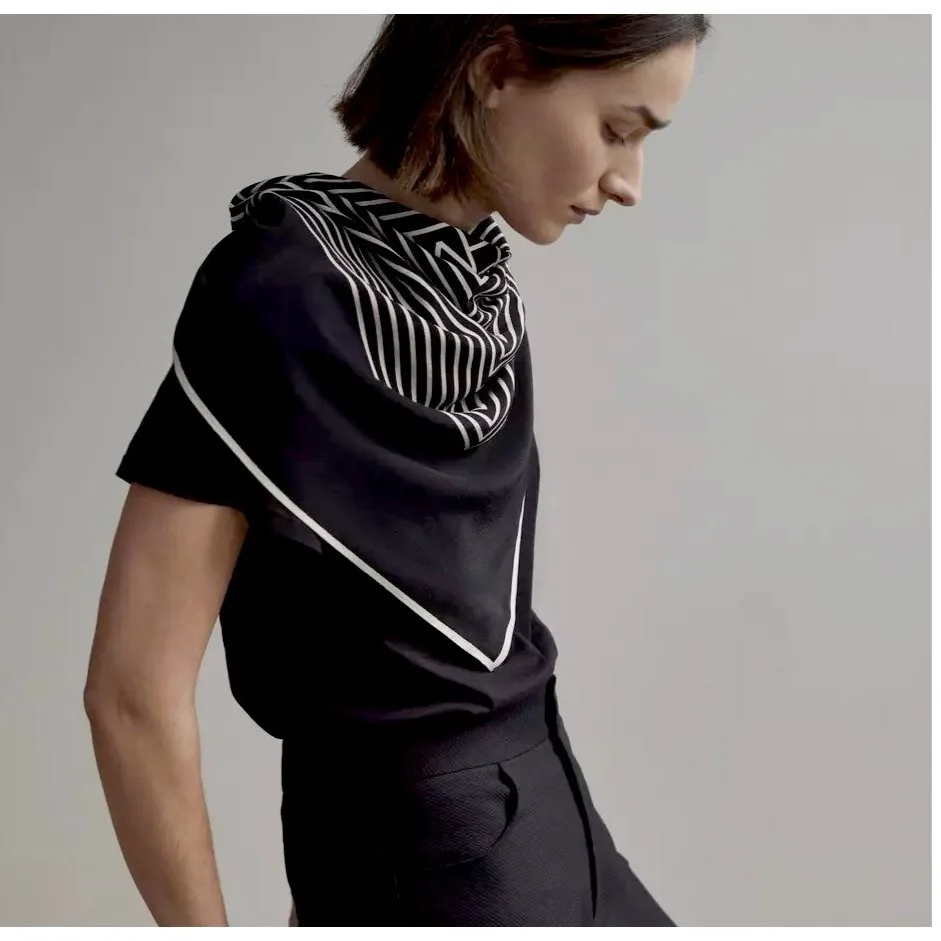 Detail view of a Modern Geometric Print 90cm Square Silk Scarf featuring a structured shape and finely finished edges, designed for comfort and style