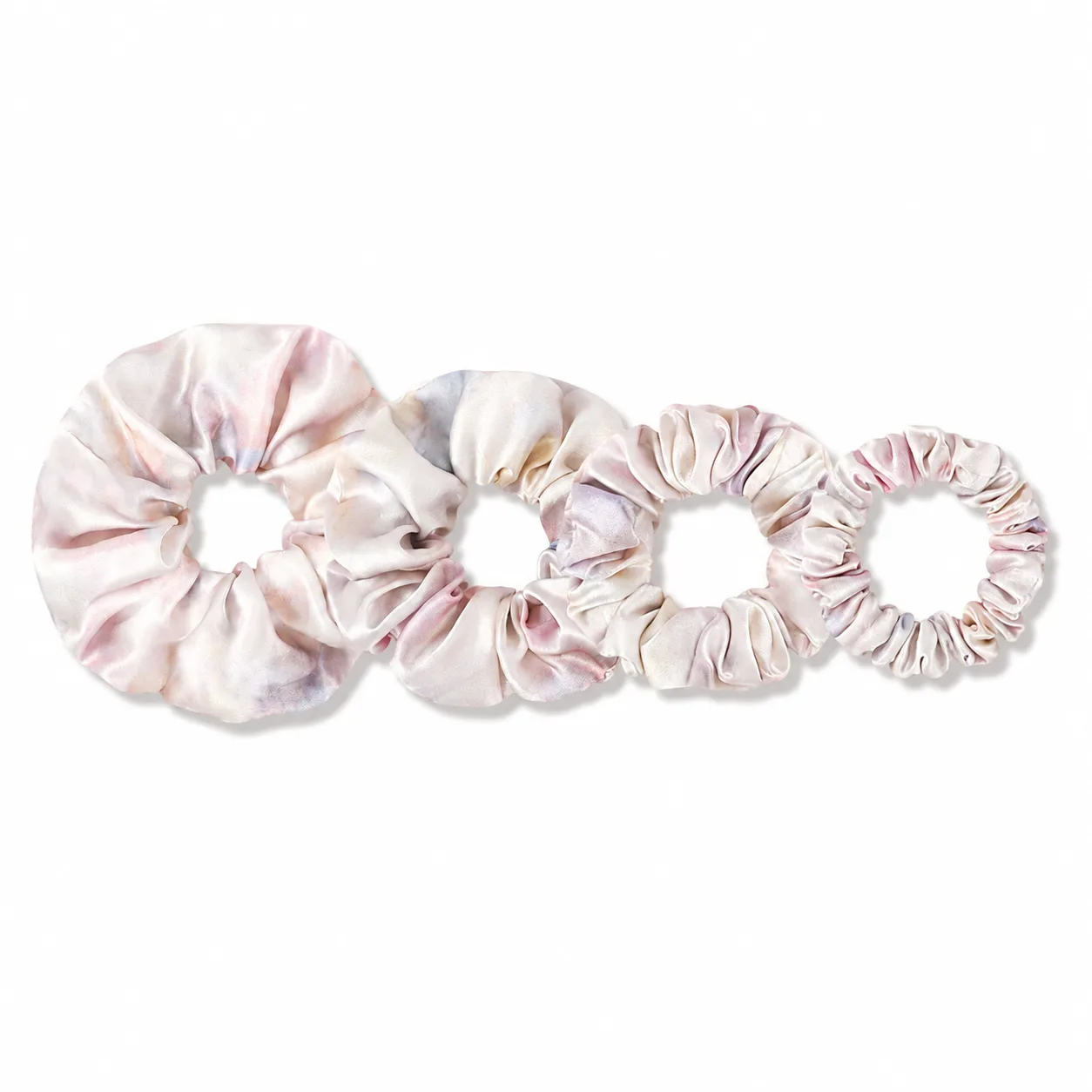Detail view of custom silk scrunchies showcasing gathered construction and elastic fit for comfort, ideal for private label brands