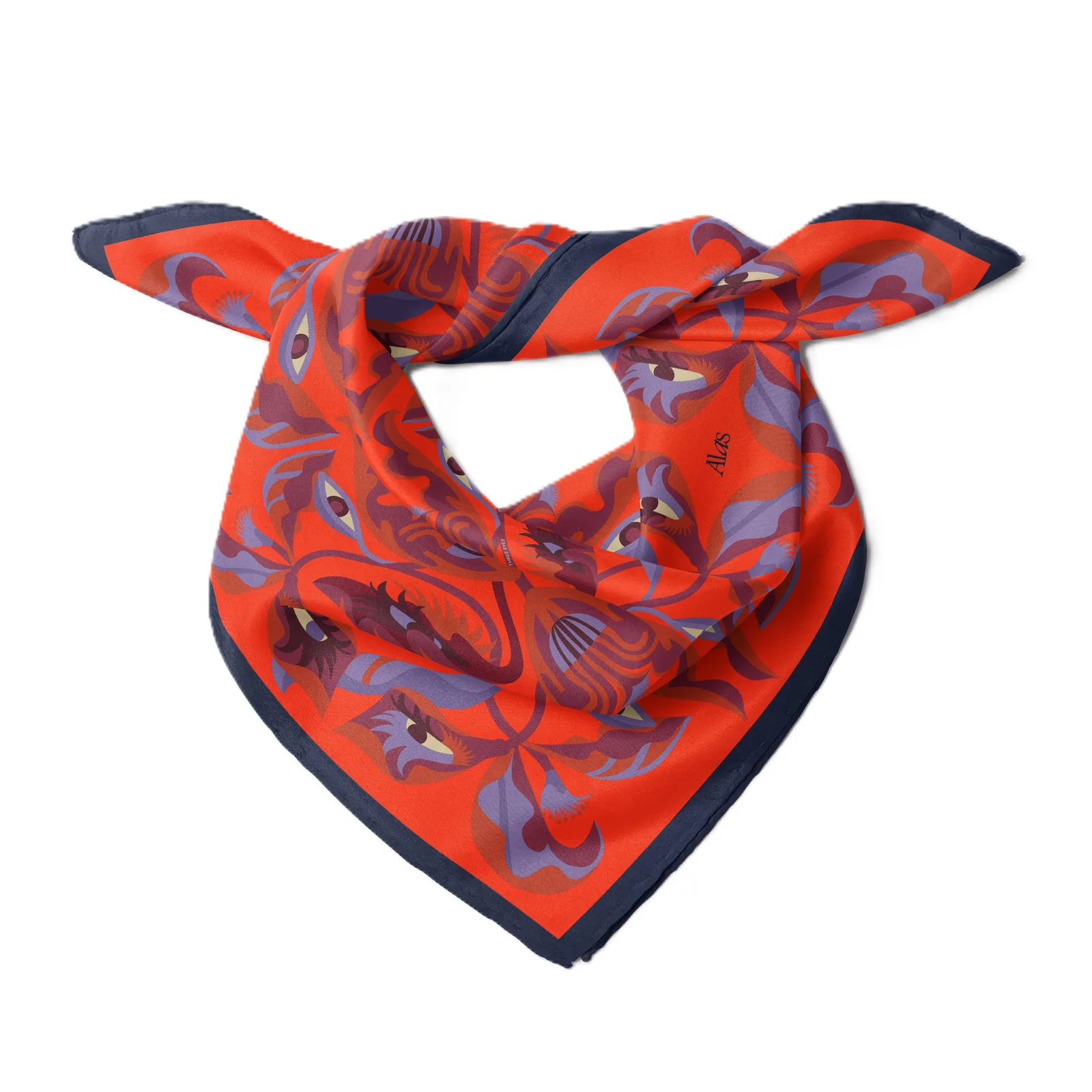 Detail view showcasing the fold and drape of a custom silk scarf, designed for comfort and versatility in styling, featuring clean edge finishes and a