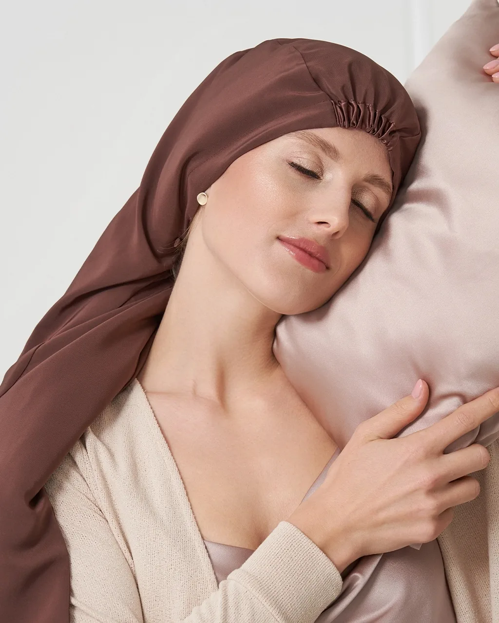 Detail view showcasing the structured fit and elastic band of the custom silk sleep cap, designed for comfort and ease of use during sleep