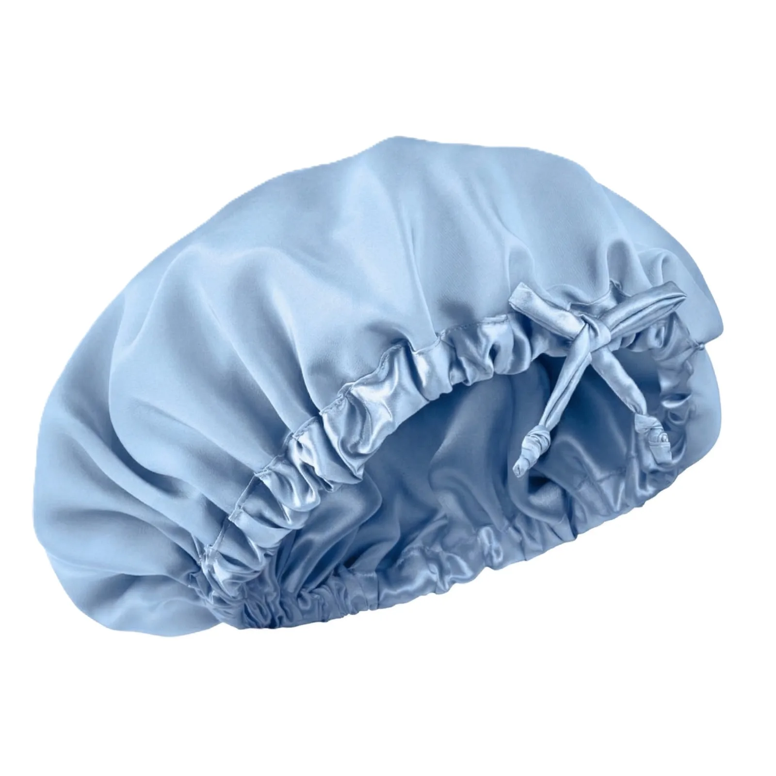 Detail view of custom silk sleep cap featuring gathered elastic construction and adjustable tie for secure fit, designed for comfort and effective