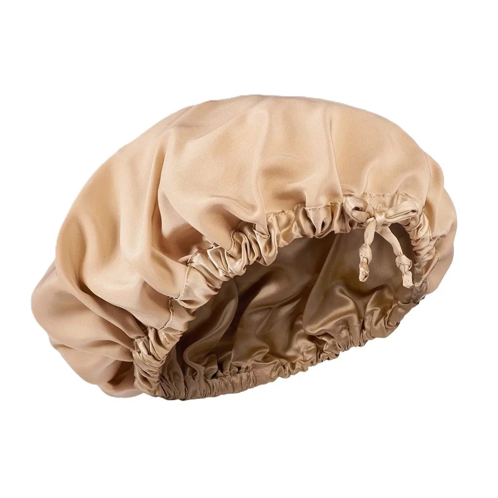 Detail view of a custom silk sleep cap featuring gathered elastic and adjustable drawstring, designed for comfort and a secure fit, ideal for hair