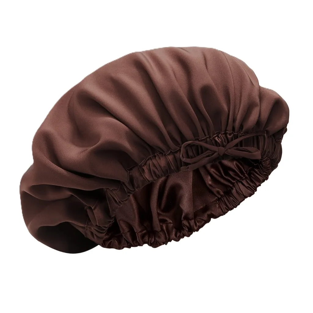 Detail view of a custom silk sleep cap featuring a gathered edge finish and adjustable tie for a secure fit, designed for comfort during use