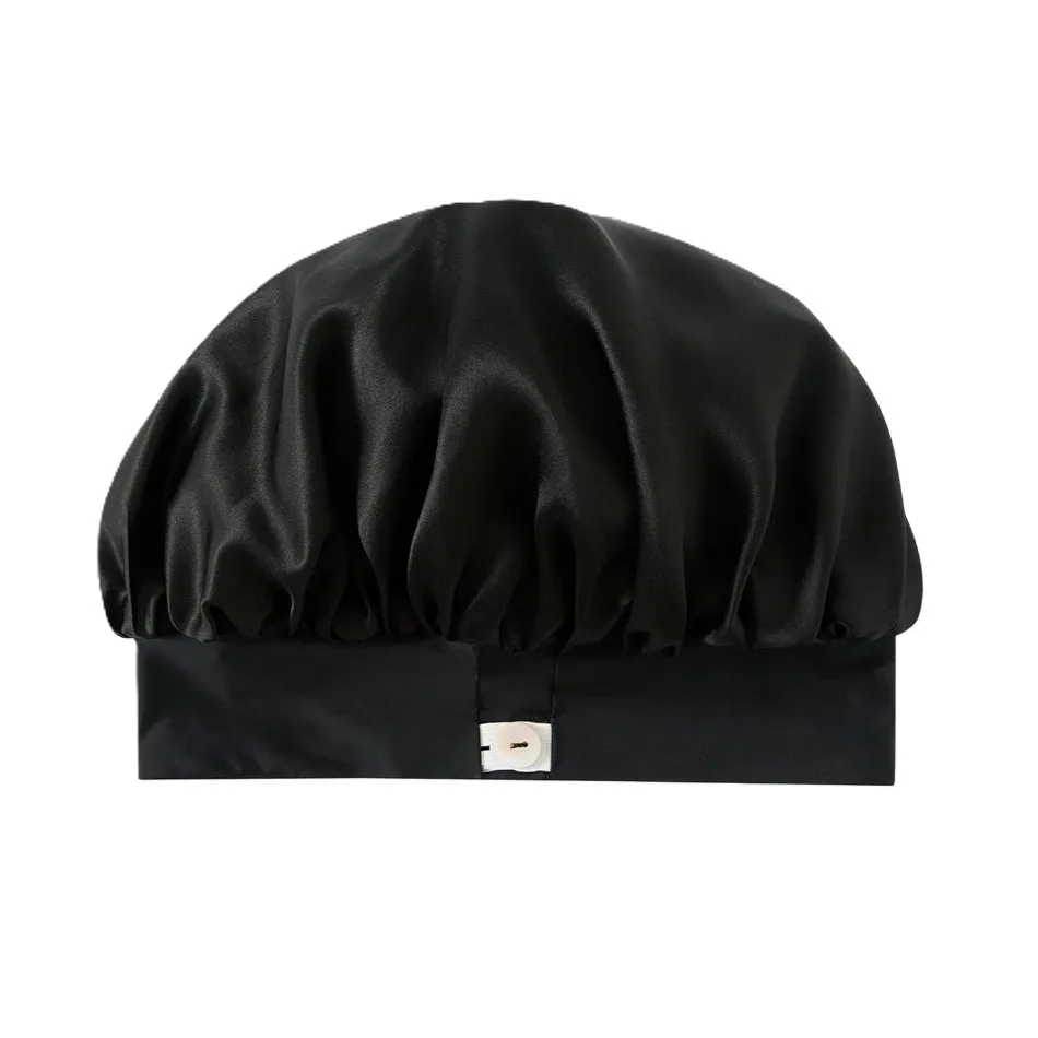 Detail view showcasing the structured design of the custom silk sleep cap, featuring a gathered top for comfort and an elastic band for secure fit