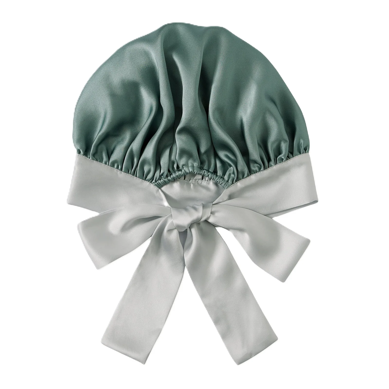Custom double-layer mulberry silk sleep bonnet with contrast satin bow tie band, available in private label colorways for hair care and beauty brands