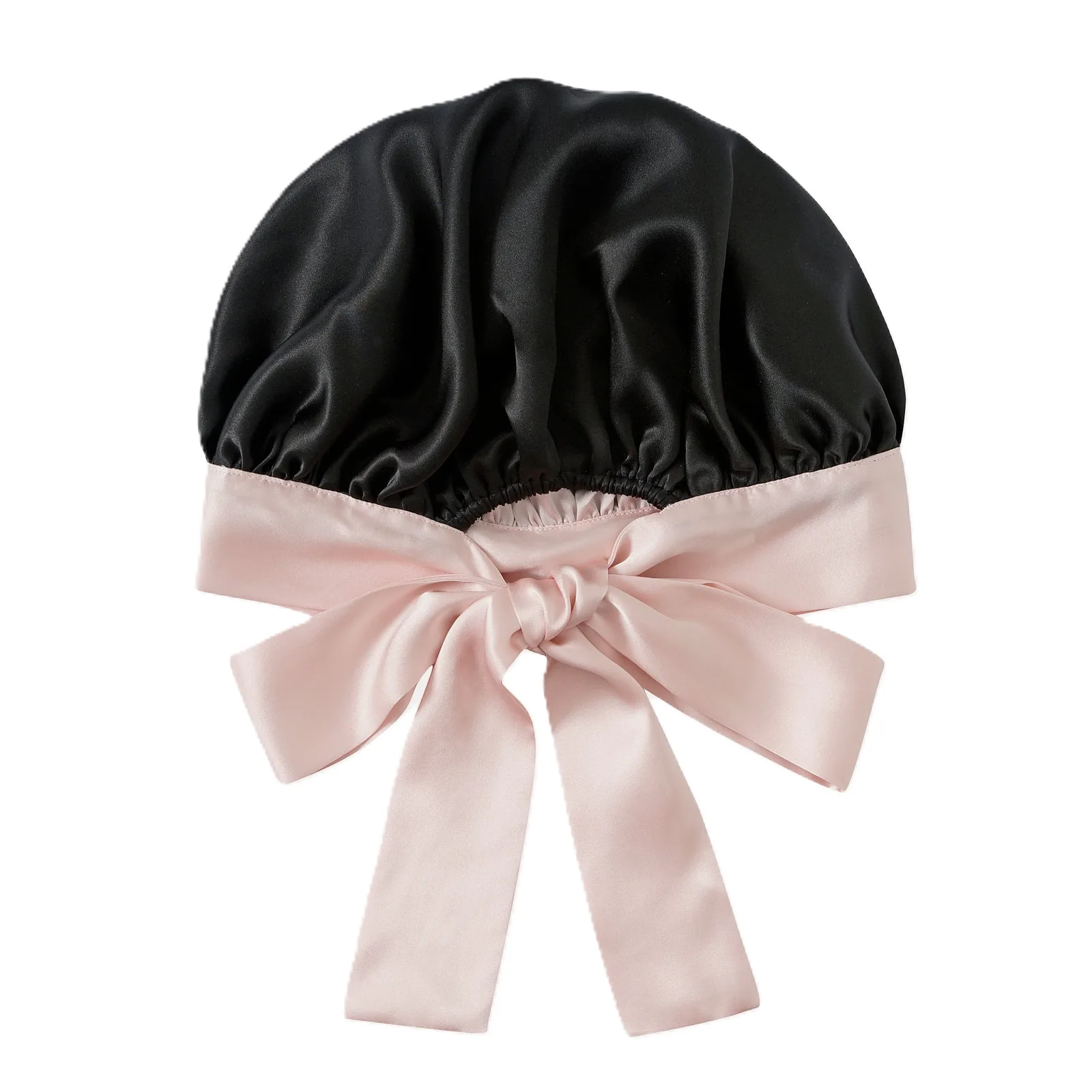 Detail view of a custom silk sleep cap showcasing its gathered construction and satin finish, designed for optimal comfort and hair protection for