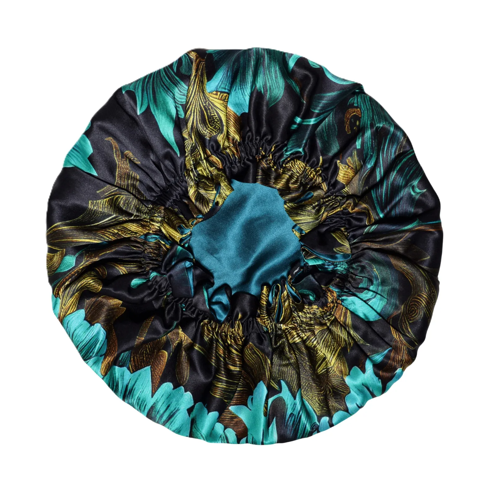 Detail view showcasing the gathered construction and elastic fit of a custom silk sleep cap for private label beauty brands, designed for comfort and